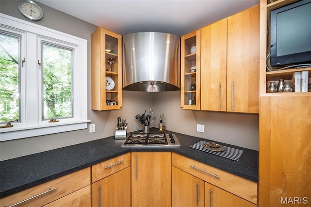 1211 S Geyer Rd, Saint Louis, MO 63122 - kitchen featuring wall chimney exhaust hood, stainless steel gas cooktop, glass insert cabinets, and dark countertops