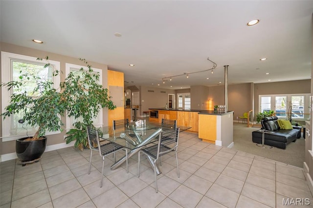 1211 S Geyer Rd, Saint Louis, MO 63122 - dining room featuring recessed lighting, light tile patterned flooring, baseboards, and plenty of natural light