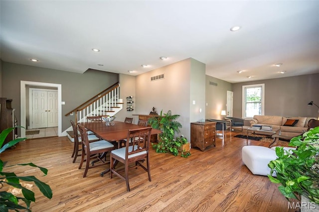 1211 S Geyer Rd, Saint Louis, MO 63122 - dining space featuring stairway, light wood-type flooring, and recessed lighting