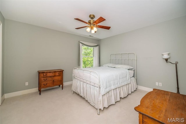 1211 S Geyer Rd, Saint Louis, MO 63122 - bedroom with baseboards, light carpet, and ceiling fan