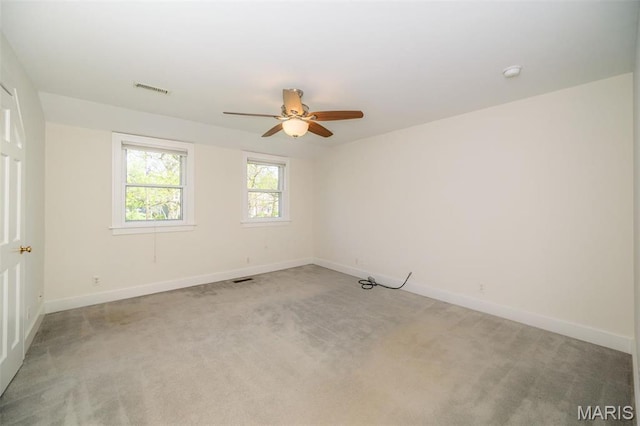 1211 S Geyer Rd, Saint Louis, MO 63122 - unfurnished room featuring ceiling fan, baseboards, light carpet, and a smoke detector