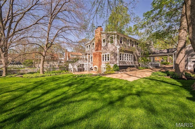 1211 S Geyer Rd, Saint Louis, MO 63122 - back of house with a chimney and a patio