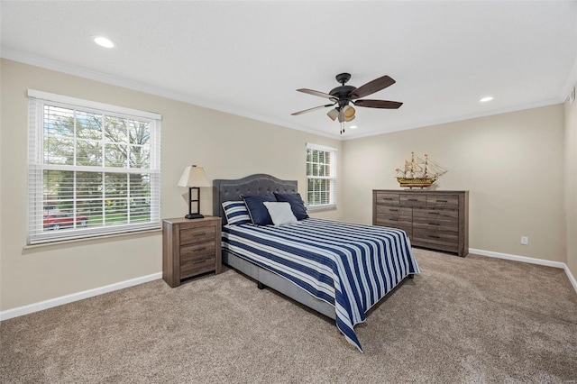 bedroom featuring light colored carpet, multiple windows, baseboards, recessed lighting, and crown molding