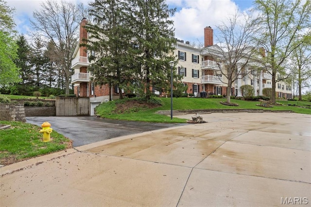 15038 Claymoor Ct Unit 2, Chesterfield, MO 63017 - view of front of property featuring a front lawn