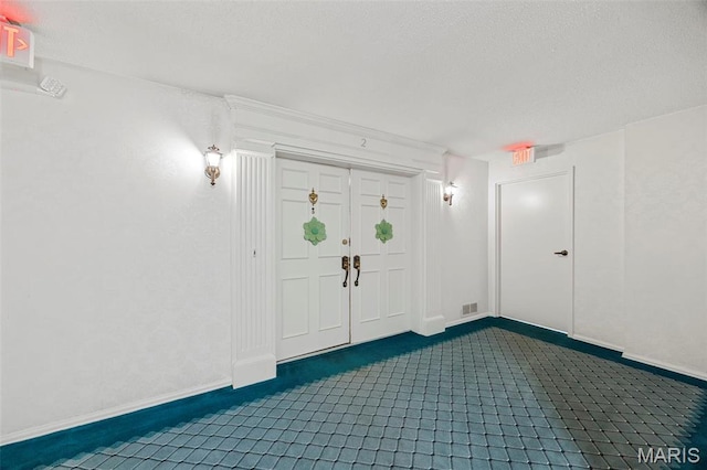 15038 Claymoor Ct Unit 2, Chesterfield, MO 63017 - entryway with dark colored carpet and baseboards