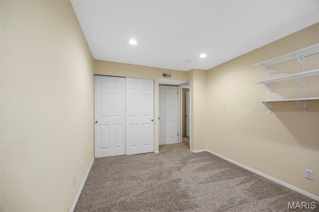 15038 Claymoor Ct Unit 2, Chesterfield, MO 63017 - unfurnished bedroom featuring carpet, baseboards, recessed lighting, and a closet