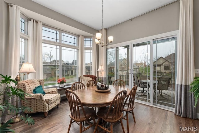 408 Hamlet Ct, Lake St Louis, MO 63367 - dining area with hardwood / wood-style floors and a chandelier