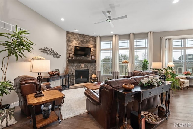 408 Hamlet Ct, Lake St Louis, MO 63367 - living room featuring a ceiling fan, a stone fireplace, wood finished floors, and recessed lighting