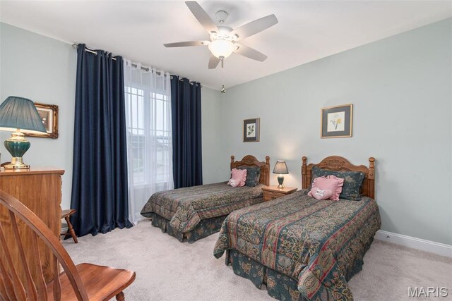 408 Hamlet Ct, Lake St Louis, MO 63367 - carpeted bedroom with baseboards and a ceiling fan