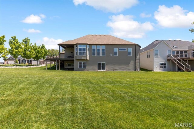 408 Hamlet Ct, Lake St Louis, MO 63367 - back of house with a yard, stairs, and a wooden deck