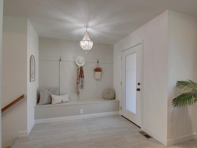 504 Timber View Ter, Hannibal, MO 63401 - mudroom featuring a chandelier and baseboards