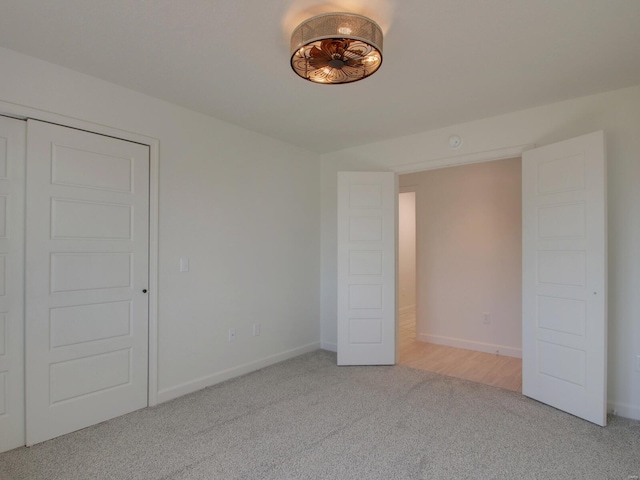 504 Timber View Ter, Hannibal, MO 63401 - unfurnished bedroom with light carpet and baseboards