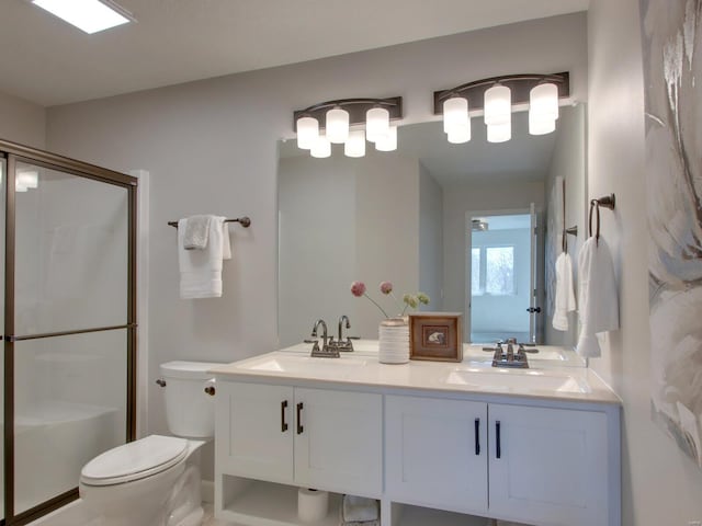 504 Timber View Ter, Hannibal, MO 63401 - full bath with a stall shower, toilet, and double vanity