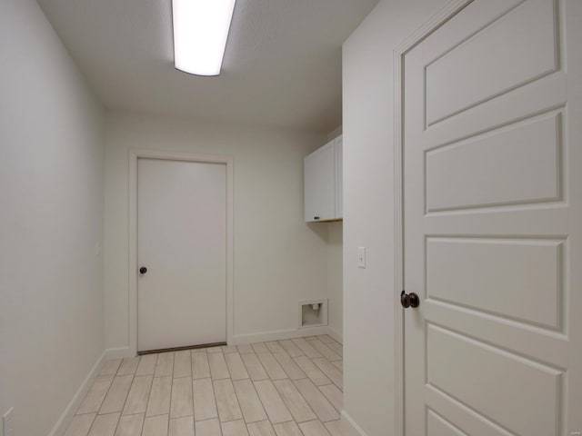 504 Timber View Ter, Hannibal, MO 63401 - washroom featuring cabinet space, baseboards, and hookup for a washing machine