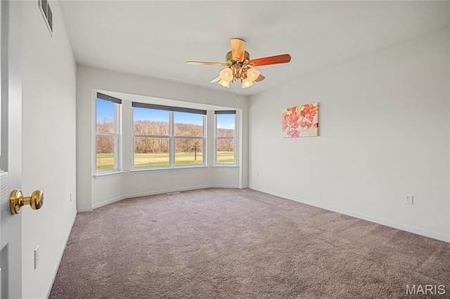 918 Fairway Dr, Union, MO 63084 - unfurnished room with carpet floors, a ceiling fan, and baseboards