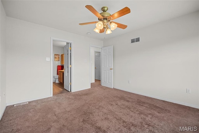 918 Fairway Dr, Union, MO 63084 - unfurnished bedroom featuring carpet flooring, baseboards, ensuite bathroom, and a ceiling fan