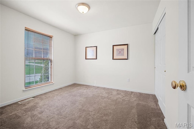 918 Fairway Dr, Union, MO 63084 - unfurnished bedroom featuring carpet, a closet, and baseboards