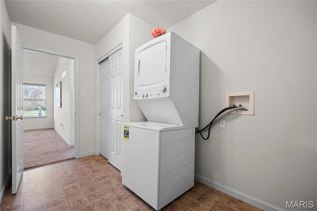 918 Fairway Dr, Union, MO 63084 - washroom with stacked washer / dryer and baseboards