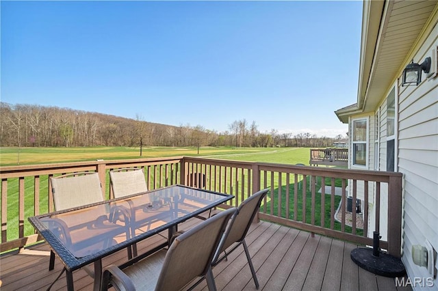 918 Fairway Dr, Union, MO 63084 - wooden terrace featuring outdoor dining area and a yard