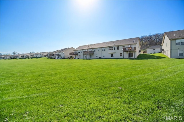 918 Fairway Dr, Union, MO 63084 - back of property featuring a yard and a residential view