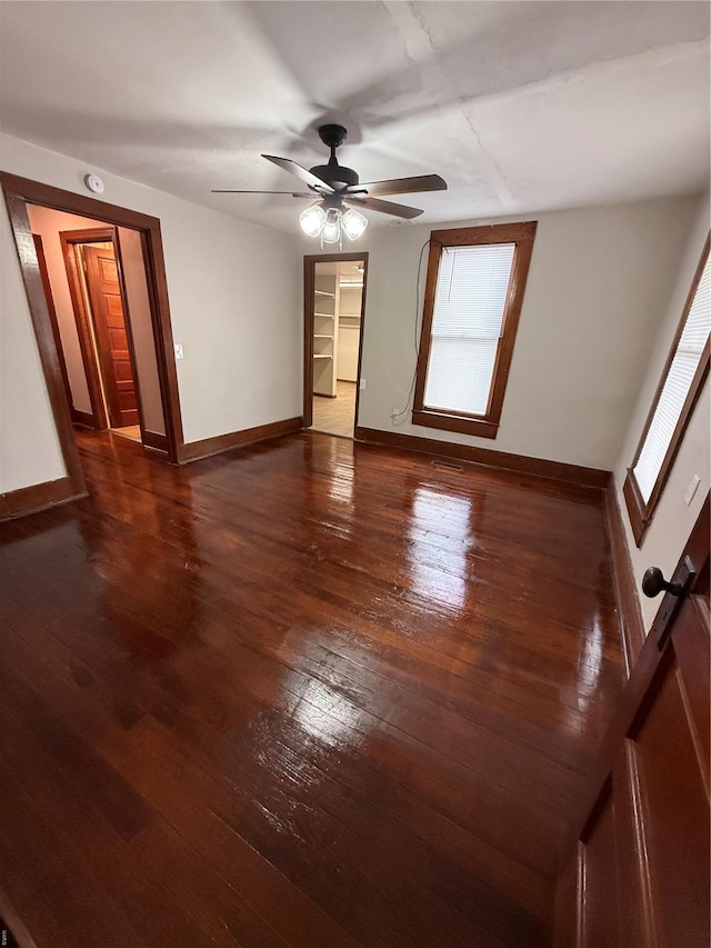 13978 Pike 496, Bowling Green, MO 63334 - empty room featuring baseboards, a ceiling fan, and hardwood / wood-style floors