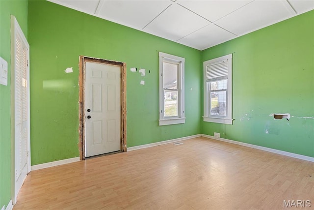 104 S 4th St, De Soto, MO 63020 - empty room with light wood finished floors