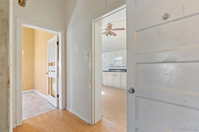 104 S 4th St, De Soto, MO 63020 - hall with light wood finished floors