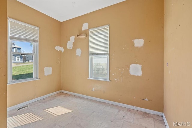 104 S 4th St, De Soto, MO 63020 - empty room featuring baseboards