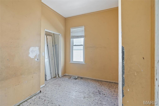 104 S 4th St, De Soto, MO 63020 - spare room with baseboards