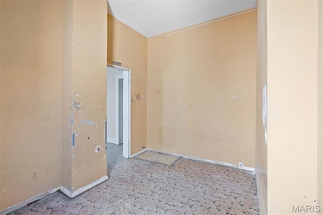 104 S 4th St, De Soto, MO 63020 - spare room featuring baseboards