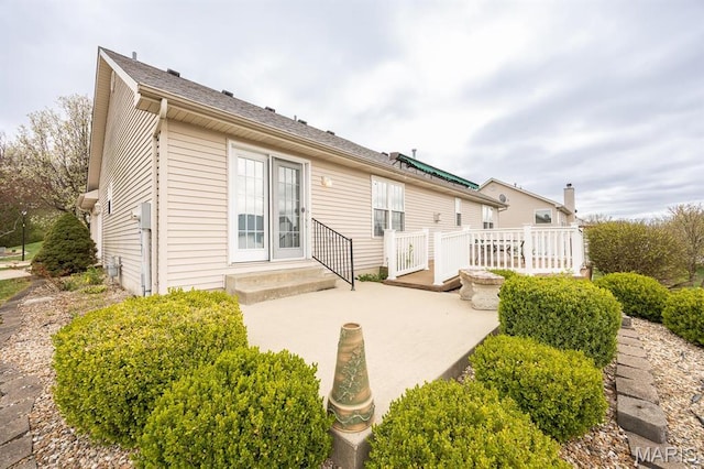 rear view of property with a patio area