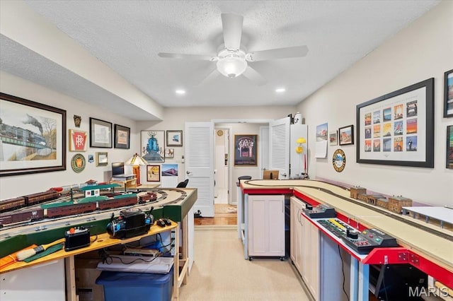 10358 Chimney Rock Dr Unit 2, Saint Louis, MO 63146 - kitchen with a ceiling fan, white cabinets, recessed lighting, a textured ceiling, and light colored carpet