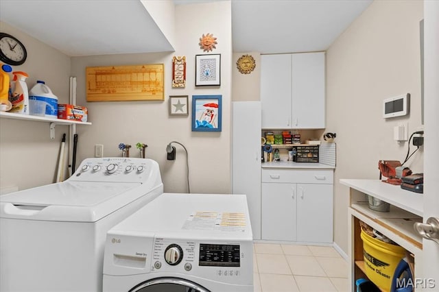 10358 Chimney Rock Dr Unit 2, Saint Louis, MO 63146 - laundry room featuring separate washer and dryer and light tile patterned floors