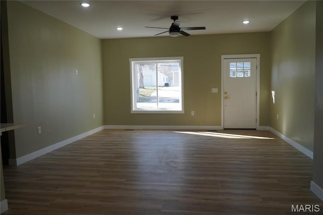 unfurnished living room with a ceiling fan, wood finished floors, baseboards, and recessed lighting