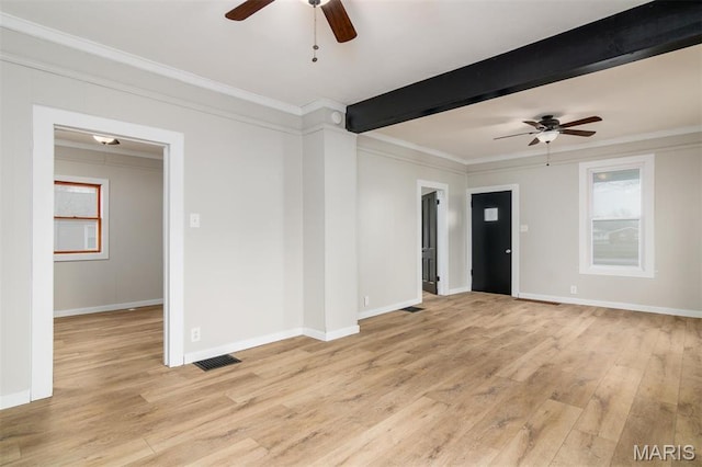 800 Frey St, Gillespie, IL 62033 - empty room featuring ceiling fan, crown molding, light wood finished floors, baseboards, and beamed ceiling