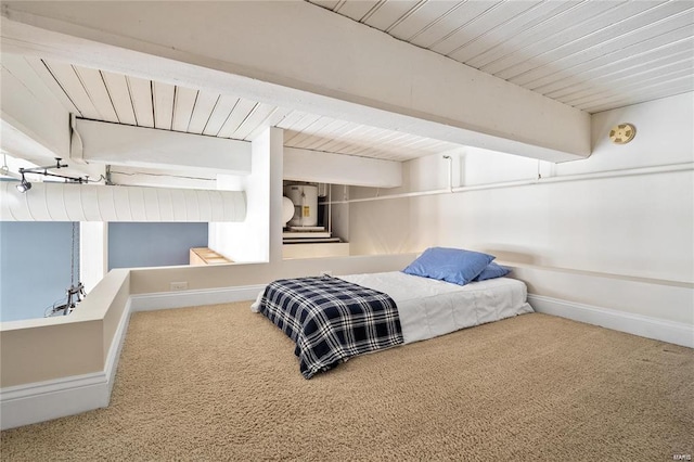 bedroom featuring carpet flooring, wooden ceiling, and baseboards