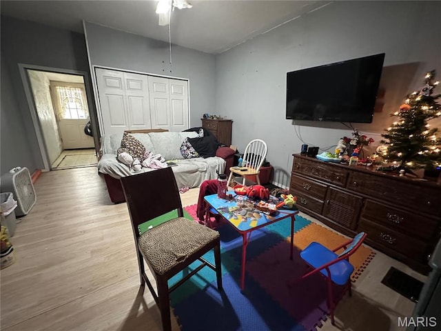 2108 Chippewa St, Saint Louis, MO 63118 - living area featuring light wood-type flooring and ceiling fan
