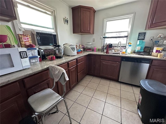 2108 Chippewa St, Saint Louis, MO 63118 - kitchen featuring stainless steel dishwasher, white microwave, a sink, light tile patterned floors, and cooling unit