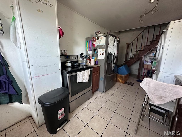 2108 Chippewa St, Saint Louis, MO 63118 - kitchen with stainless steel appliances and light tile patterned flooring