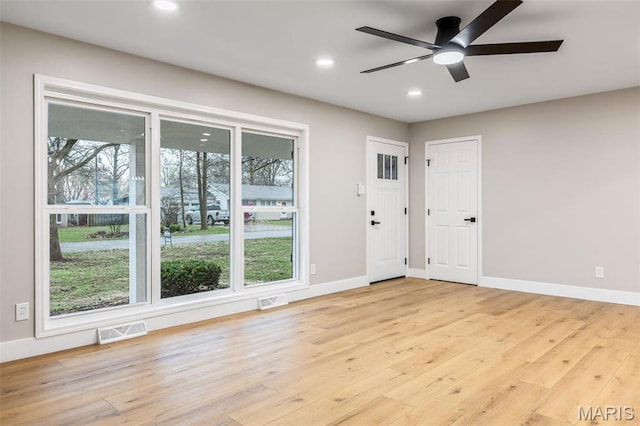 1121 E Cap Au Gris St, Troy, MO 63379 - spare room featuring plenty of natural light, a ceiling fan, recessed lighting, baseboards, and light wood-type flooring