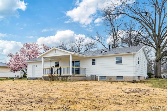 1121 E Cap Au Gris St, Troy, MO 63379 - rear view of house featuring covered porch, central AC unit, and a shingled roof