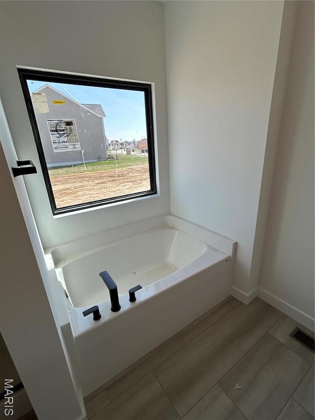 bathroom with a bath