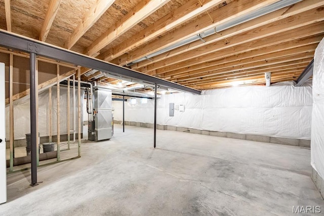 unfinished basement with heating unit