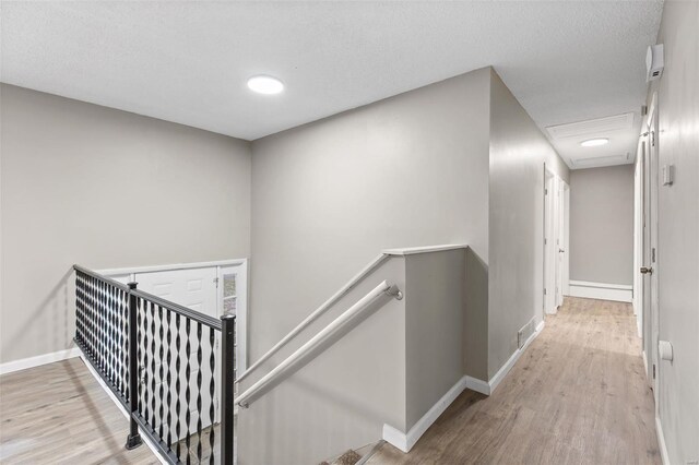 1680 Neff Rd, Saint Clair, MO 63077 - hall with an upstairs landing, wood finished floors, and baseboards