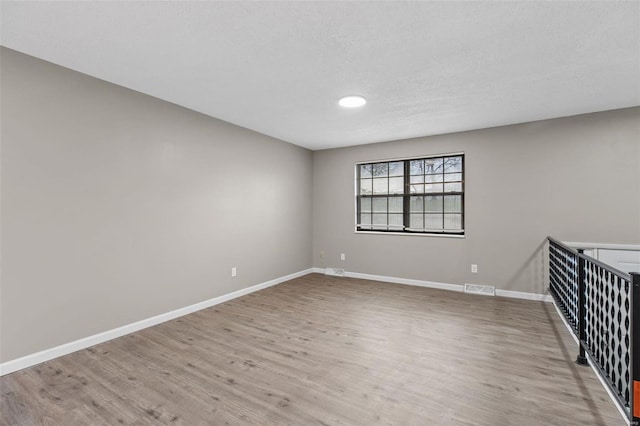 1680 Neff Rd, Saint Clair, MO 63077 - spare room featuring light wood-type flooring and baseboards