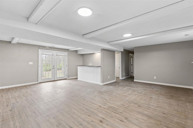 1680 Neff Rd, Saint Clair, MO 63077 - below grade area with light wood finished floors, baseboards, and french doors