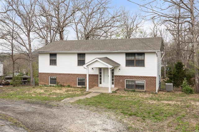 1680 Neff Rd, Saint Clair, MO 63077 - bi-level home featuring brick siding and cooling unit