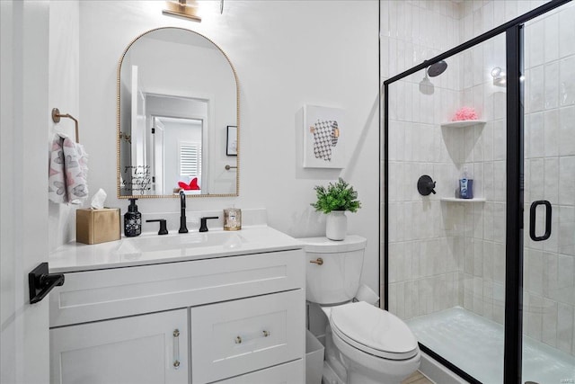 914 Memsie Park Ct, Ofallon, MO 63368 - bathroom featuring a shower stall, toilet, and vanity
