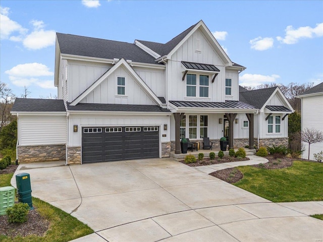 914 Memsie Park Ct, Ofallon, MO 63368 - view of front of property with a porch, board and batten siding, stone siding, and a standing seam roof