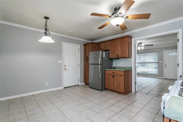 28 Countryside Ln, Fairview Heights, IL 62208 - kitchen featuring freestanding refrigerator, ceiling fan, crown molding, white range with gas stovetop, and light tile patterned flooring